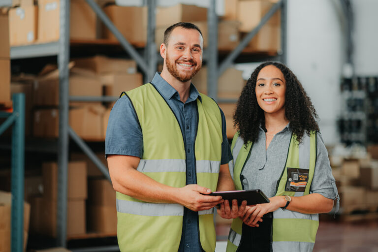 Logistics workers, employees and people working on tablet, doing stock check at factory and online for inventory in collaboration at a distribution warehouse. Portrait of team at industrial workshop