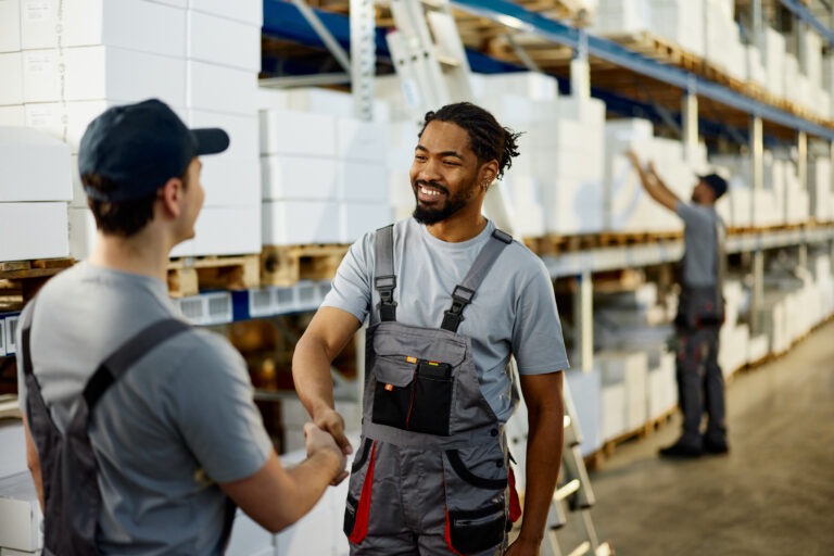 Successful deal between warehouse workers!