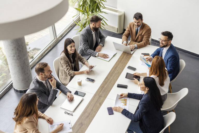 Top view of leadership team having sprint meeting in corporate firm at boardroom.